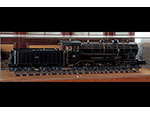 Modelo de locomotora de vapor tipo 240, serie 1100 de MZA, galardonada en la Exposición Iberoamericana de Sevilla de 1929 (Talleres Generales de MZA, Ingeniero-jefe Manuel Villar Lopesino, Madrid, 1929). Escala: 1:10. Medidas: 45 x 203 x 30 cm. - Pieza IG: 00340